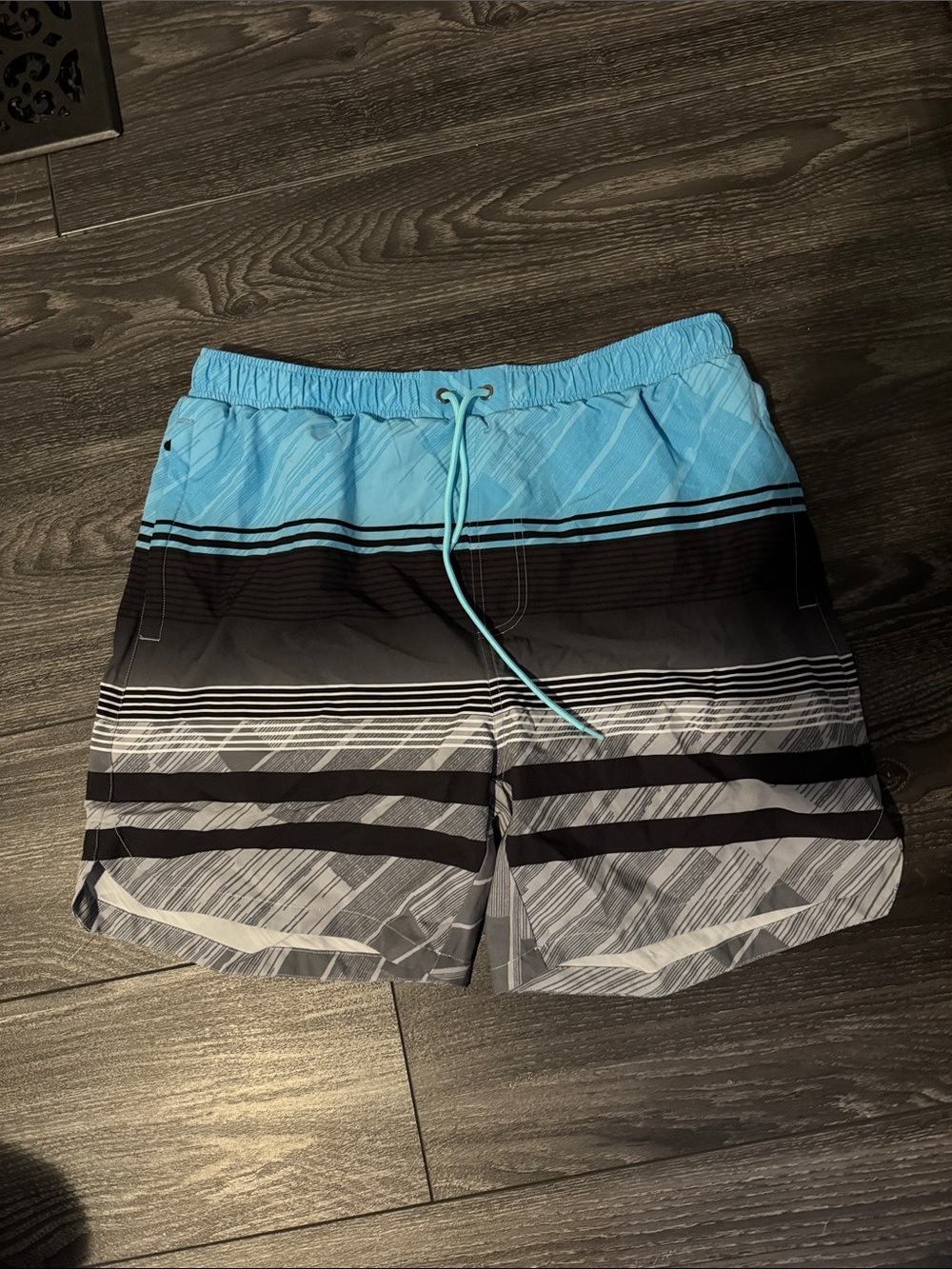 Light Blue and Black Men's Swim Trunks with Striped Pattern